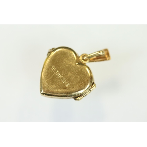 116 - 9ct yellow gold heart-shaped locket pendant, fine link 9ct chain; together with a 9ct gold front and... 