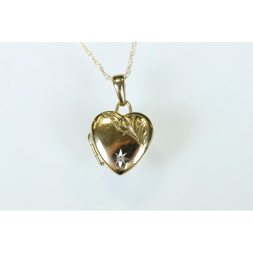 116 - 9ct yellow gold heart-shaped locket pendant, fine link 9ct chain; together with a 9ct gold front and... 