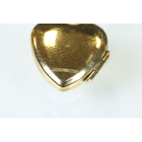 116 - 9ct yellow gold heart-shaped locket pendant, fine link 9ct chain; together with a 9ct gold front and... 
