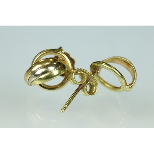 117 - Two pairs of 9ct gold stud earrings together with three pairs of yellow metal earrings (q)
