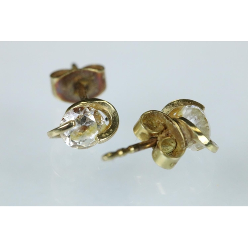 117 - Two pairs of 9ct gold stud earrings together with three pairs of yellow metal earrings (q)
