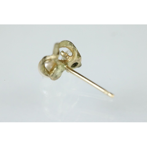 117 - Two pairs of 9ct gold stud earrings together with three pairs of yellow metal earrings (q)