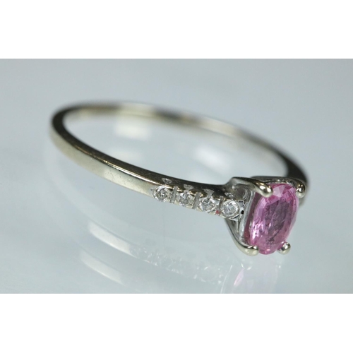 94 - Pink sapphire and diamond 18ct white gold ring, the oval mixed cut pink sapphire measuring approx 5.... 