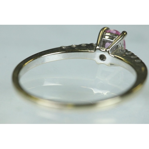 94 - Pink sapphire and diamond 18ct white gold ring, the oval mixed cut pink sapphire measuring approx 5.... 