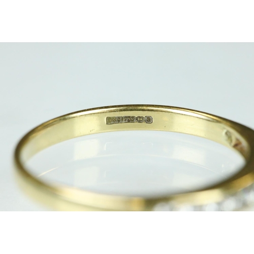 95 - Diamond 18ct yellow gold ring, nine small round brilliant cut diamonds, channel set, ring size Q