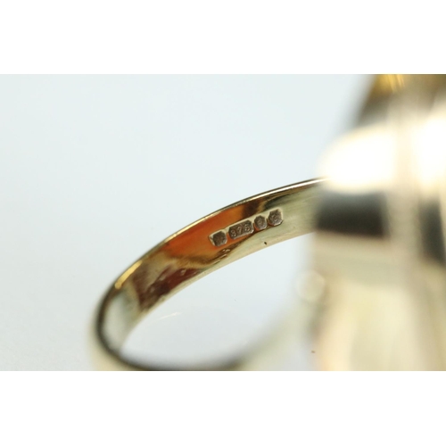 96 - Cameo 9ct yellow gold ring, rubover set, dimensions approx 26mm x 20mm, v shaped shoulders, ring siz... 