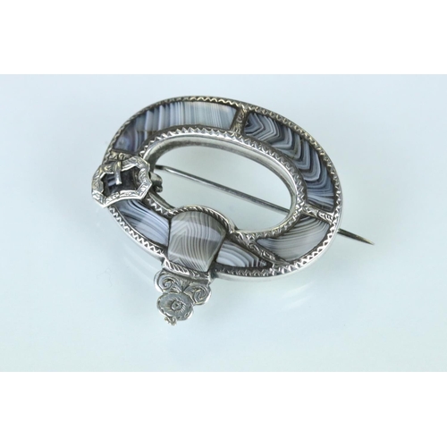 97 - 19th century blue lace agate unmarked silver brooch, the oval design with buckle detail and engraved... 