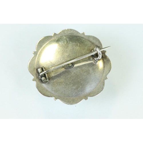 97 - 19th century blue lace agate unmarked silver brooch, the oval design with buckle detail and engraved... 