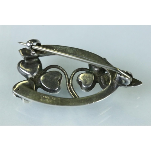 97 - 19th century blue lace agate unmarked silver brooch, the oval design with buckle detail and engraved... 