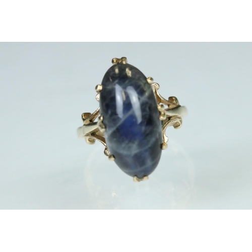 99 - Labradorite 9ct yellow gold ring, the marquise cabochon cut labradorite measuring approx 17.5mm x 9m... 