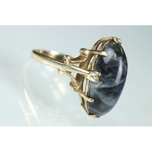 99 - Labradorite 9ct yellow gold ring, the marquise cabochon cut labradorite measuring approx 17.5mm x 9m... 