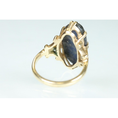 99 - Labradorite 9ct yellow gold ring, the marquise cabochon cut labradorite measuring approx 17.5mm x 9m... 