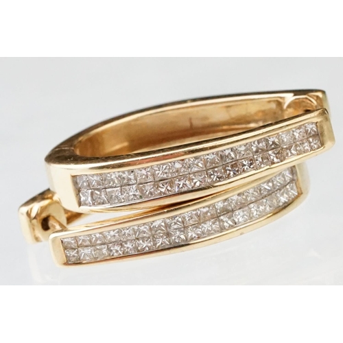 44 - Pair of diamond 14ct yellow gold elongated hoop earrings, two rows of a total of thirty-two square m... 