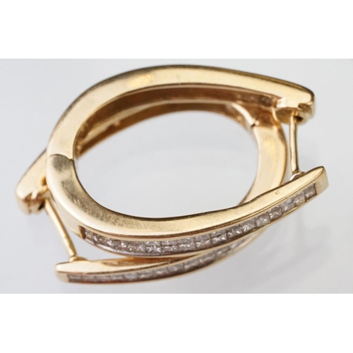 44 - Pair of diamond 14ct yellow gold elongated hoop earrings, two rows of a total of thirty-two square m... 