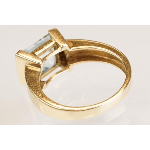61 - Topaz and diamond 9ct yellow gold ring, the square mixed cut topaz measuring approx 7.5mm x 8mm, par... 