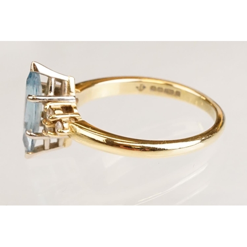 62 - Aquamarine and diamond 18ct yellow gold ring, the marquise cut aquamarine measuring approx 12.5mm x ... 