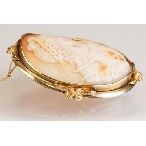 66 - 19th century shell cameo brooch depicting two female figures, yellow metal surround, hinged pin and ... 