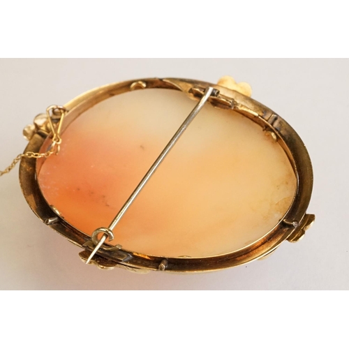 66 - 19th century shell cameo brooch depicting two female figures, yellow metal surround, hinged pin and ... 