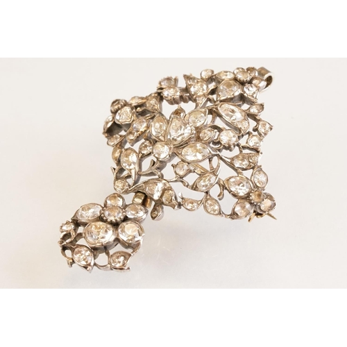 72 - Early 20th century paste set white metal 18th century style brooch, closed back settings, pendant dr... 
