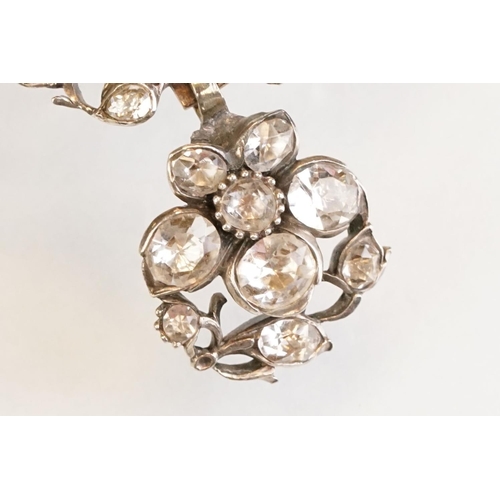 72 - Early 20th century paste set white metal 18th century style brooch, closed back settings, pendant dr... 