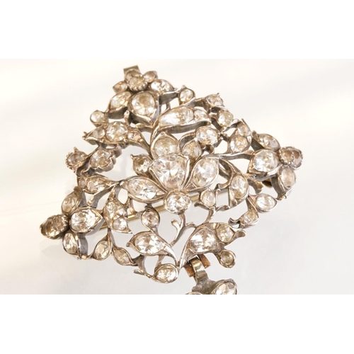 72 - Early 20th century paste set white metal 18th century style brooch, closed back settings, pendant dr... 