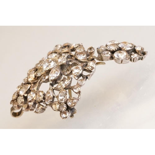 72 - Early 20th century paste set white metal 18th century style brooch, closed back settings, pendant dr... 