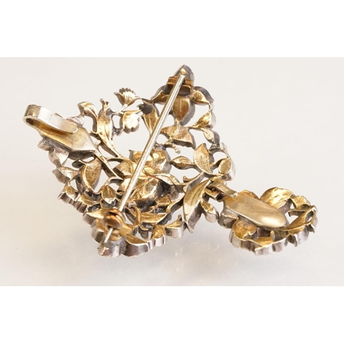72 - Early 20th century paste set white metal 18th century style brooch, closed back settings, pendant dr... 