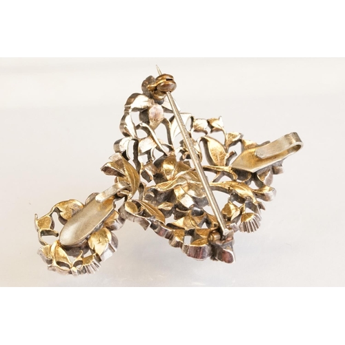 72 - Early 20th century paste set white metal 18th century style brooch, closed back settings, pendant dr... 