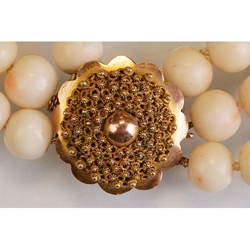 80 - Coral 14ct yellow gold three strand necklace, round coral beads, diameter approx 9mm, the cannetille... 