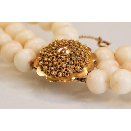 80 - Coral 14ct yellow gold three strand necklace, round coral beads, diameter approx 9mm, the cannetille... 