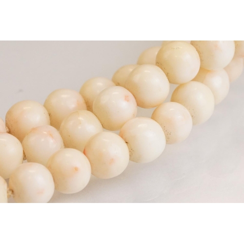 80 - Coral 14ct yellow gold three strand necklace, round coral beads, diameter approx 9mm, the cannetille... 