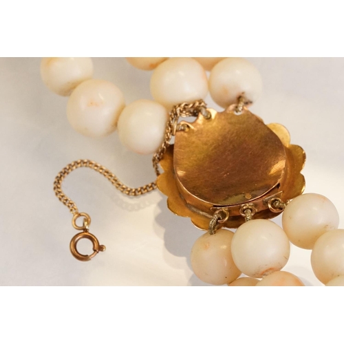 80 - Coral 14ct yellow gold three strand necklace, round coral beads, diameter approx 9mm, the cannetille... 