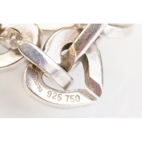 83 - Tiffany & Co parcel gilt silver heart shaped link bracelet, the centre heart gold plated, the clasp ... 