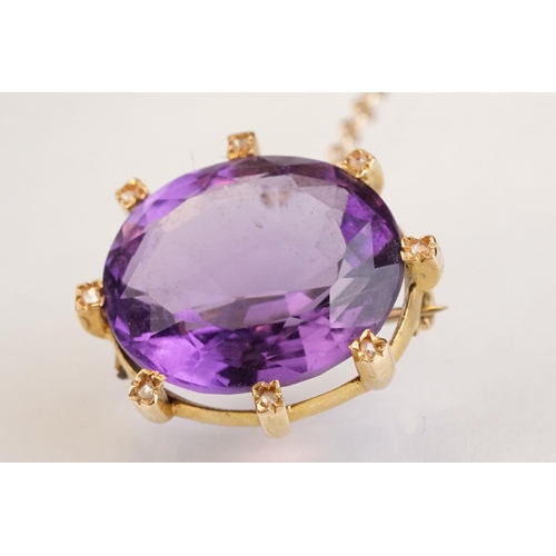 84 - Amethyst and diamond yellow metal lace pin brooch, the oval mixed cut amethyst measuring approx 18mm... 