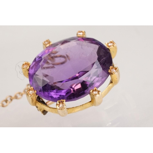 84 - Amethyst and diamond yellow metal lace pin brooch, the oval mixed cut amethyst measuring approx 18mm... 