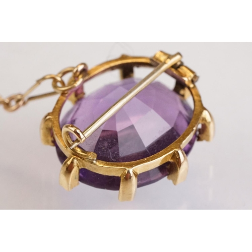 84 - Amethyst and diamond yellow metal lace pin brooch, the oval mixed cut amethyst measuring approx 18mm... 