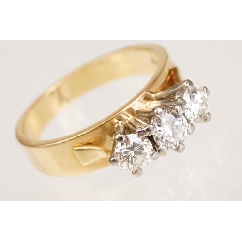 86 - Diamond three stone 18ct yellow and white gold set ring, three round brilliant cut diamonds, total d... 