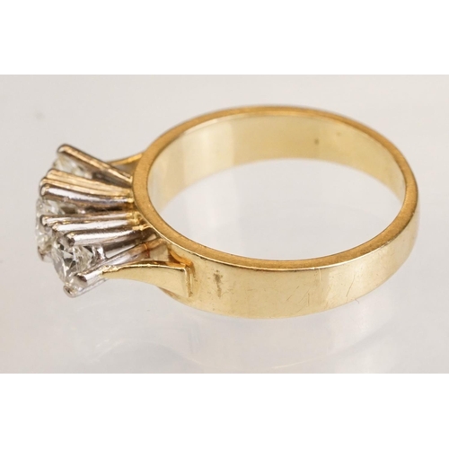 86 - Diamond three stone 18ct yellow and white gold set ring, three round brilliant cut diamonds, total d... 