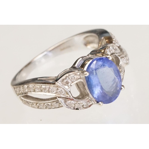 88 - Tanzanite and diamond 18ct white gold ring, the oval mixed cut tanzanite measuring approx 9mm x 7mm,... 