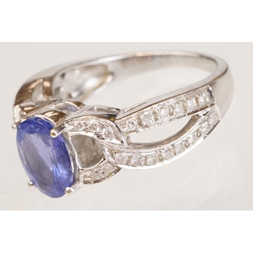 88 - Tanzanite and diamond 18ct white gold ring, the oval mixed cut tanzanite measuring approx 9mm x 7mm,... 