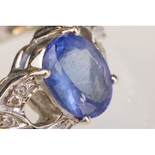 88 - Tanzanite and diamond 18ct white gold ring, the oval mixed cut tanzanite measuring approx 9mm x 7mm,... 