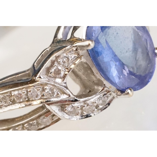 88 - Tanzanite and diamond 18ct white gold ring, the oval mixed cut tanzanite measuring approx 9mm x 7mm,... 