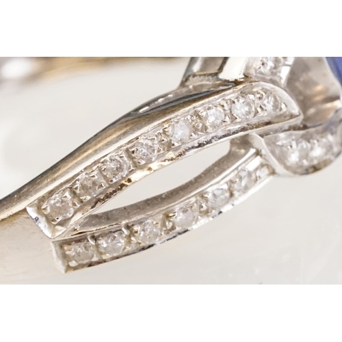 88 - Tanzanite and diamond 18ct white gold ring, the oval mixed cut tanzanite measuring approx 9mm x 7mm,... 