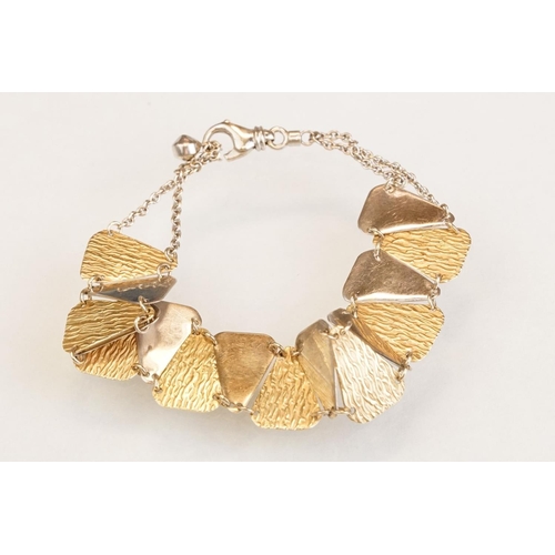 89 - 14ct yellow and white gold panel bracelet, alternating plain polished triangular white gold panels w... 