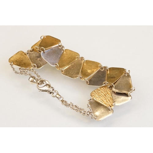89 - 14ct yellow and white gold panel bracelet, alternating plain polished triangular white gold panels w... 