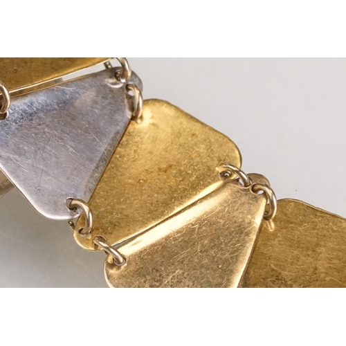 89 - 14ct yellow and white gold panel bracelet, alternating plain polished triangular white gold panels w... 