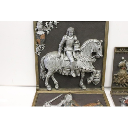 Five Marcus Designs ceramic wall plaques depicting Medieval