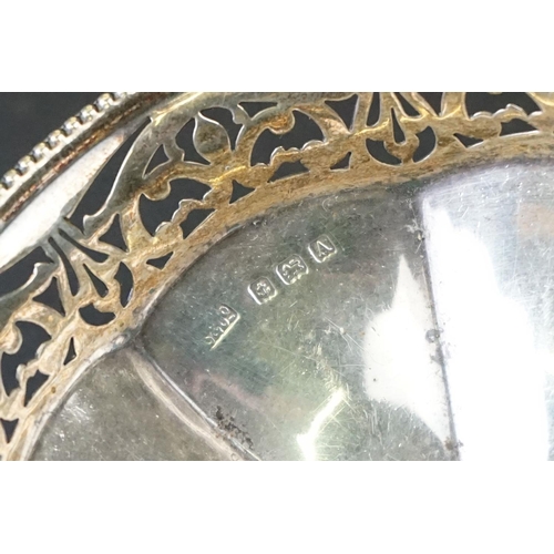 453 - Early 20th century silver bon bon dish with plain polished faceted centre, pierced border and beaded... 