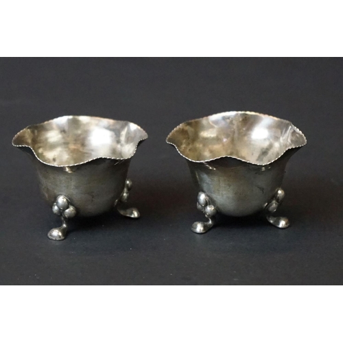 455 - Victorian set of three silver salts in the form of clam shells, each raised on three bun feet, with ... 