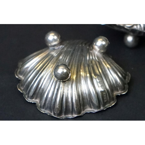 455 - Victorian set of three silver salts in the form of clam shells, each raised on three bun feet, with ... 